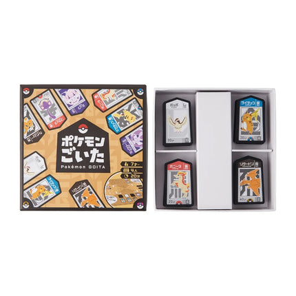 Pokémon GIOTA gift set shown open, with the illustrated box on the left and four character cards displayed in a white tray on the right.